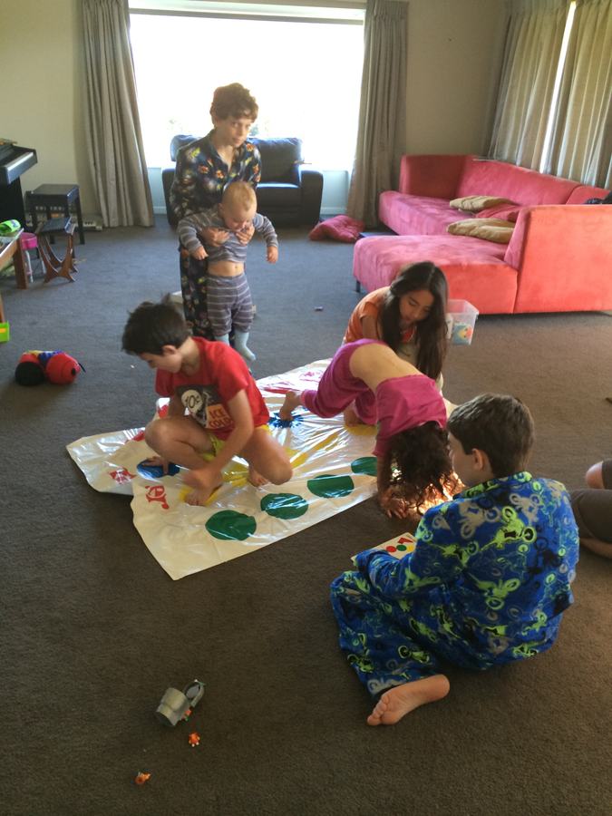 Kids playing Twister in the lounge