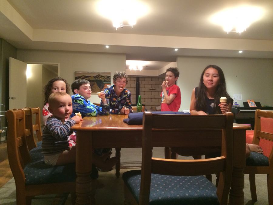 Family and friends around the dining table