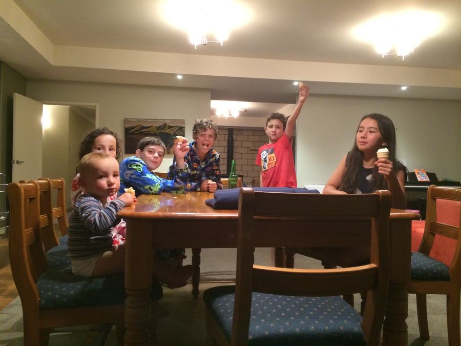 Family gathered around the dining table at home